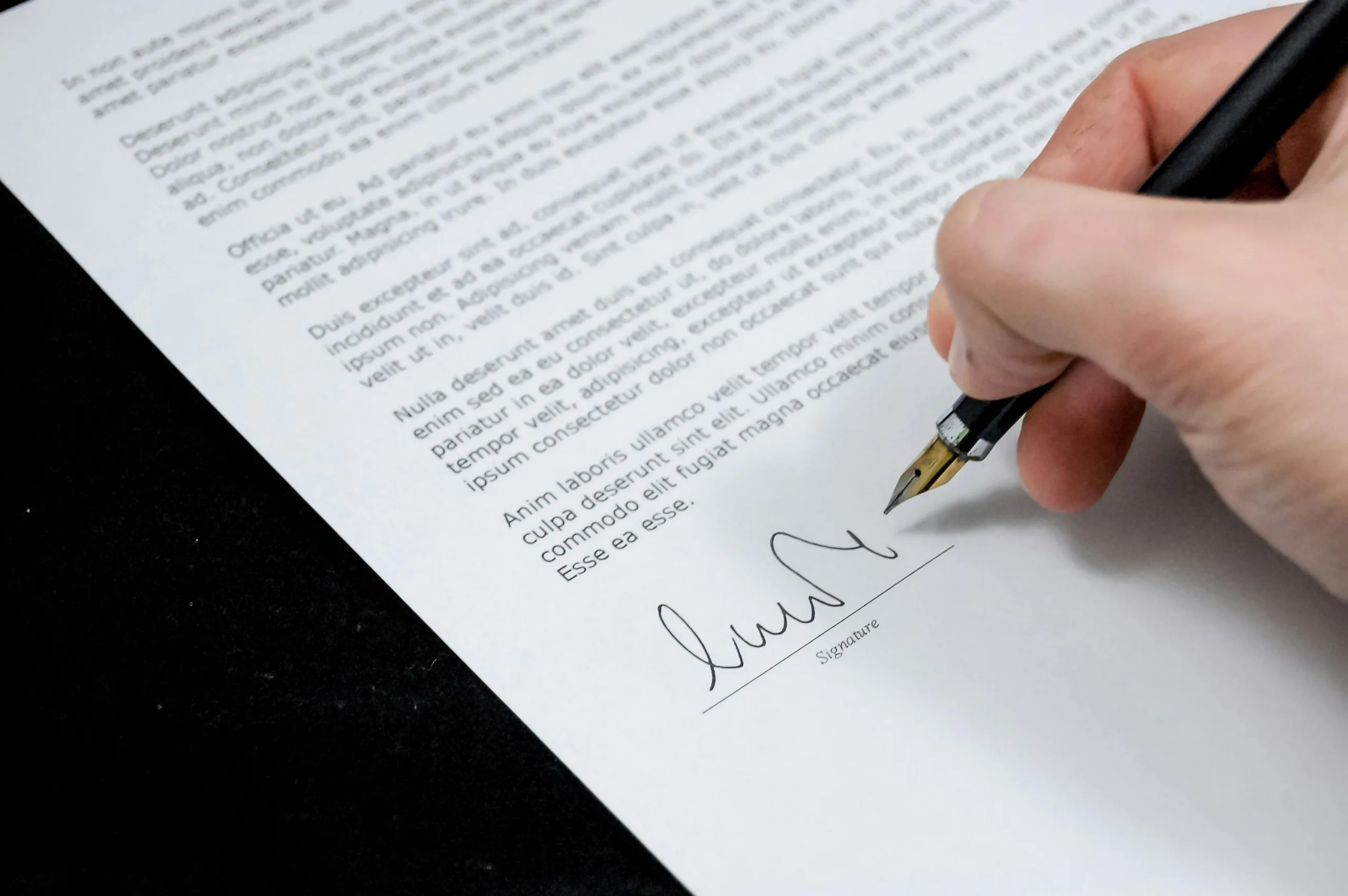 Signing a document with pen
