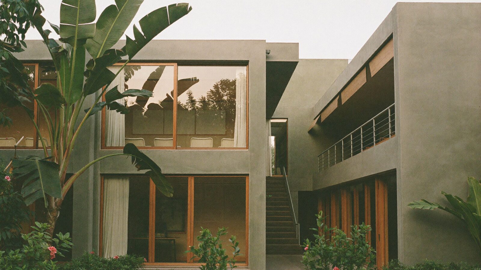 Modern consulting suites with timber screens and tropical planting in Damansara, Selangor